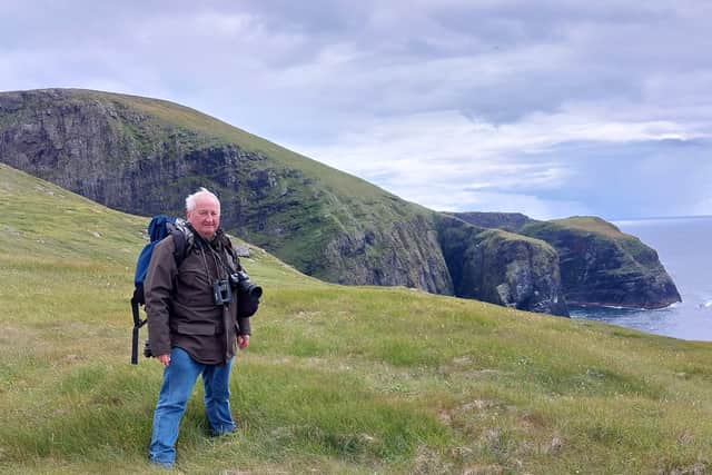 Ron Morris, of the Fife Seal Group, doing some wildlife observation on Mingulay in 2023.