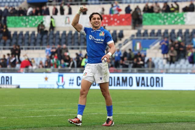 Italy's Ange Capuozzo celebrates after last season's win over Scotland.