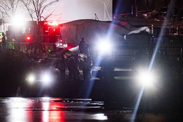 Emergency response units conduct search and rescue operations in the Potomac River near Ronald Reagan Washington Airport on January 29, 2025 in Washington, DC. An American Airlines flight from Wichita, Kansas collided with a helicopter while approaching Ronald Reagan National Airport. (Photo by Al Drago/Getty Images)