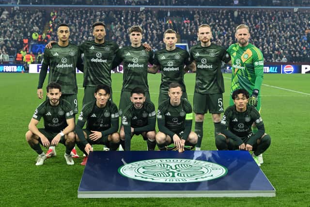 Celtic players line up ahead of their Champions League meeting with Aston Villa. (Photo by JUSTIN TALLIS/AFP via Getty Images)