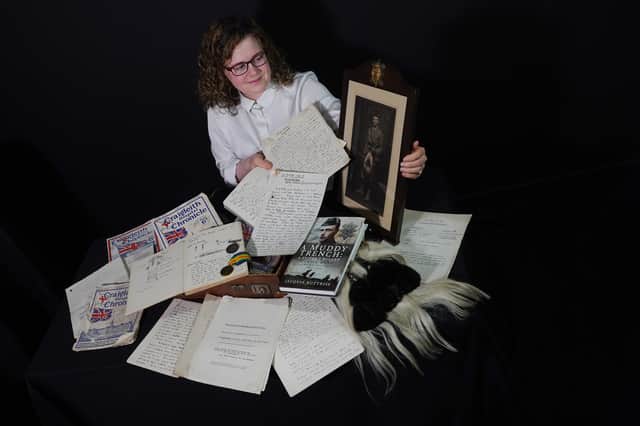 Cathy Tait, head of books and manuscripts at Edinburgh auction house Lyon & Turnbull, with an archive of First World War poetry and prose by Hamish Mann. Picture: Stewart Attwood 