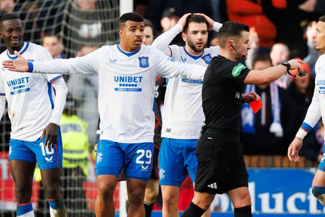 Rangers' Mohamed Diomande (far left) was shown a red card for a swinging his arm at Dundee United's Kevin Holt. (Photo by Ross Parker / SNS Group)
