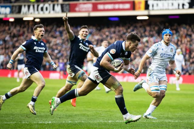 Huw Jones scores Scotland's fourth try of the match and his second en route to bagging a hat-trick against Italy. (Photo by Craig Williamson / SNS Group)