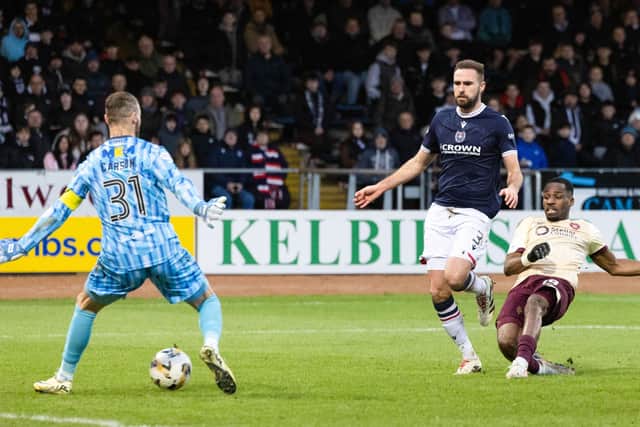 Elton Kabangu scores the first of his double to give Hearts a 3-0 lead over Dundee. (Photo by Mark Scates / SNS Group)