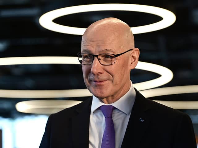First Minister John Swinney 