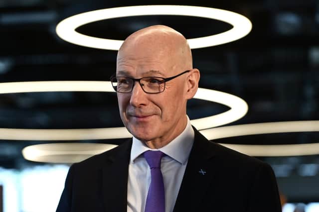 First Minister John Swinney delivers a speech focused on the Scottish economy in central Glasgow