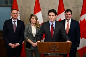 Canada's Prime Minister Justin Trudeau addresses media following the imposition of a raft of tariffs by US President Donald Trump against Canada, Mexico and China