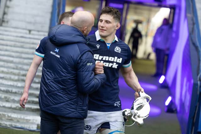 Scotland head coach Gregor Townsend talks to Rory Darge after the win.