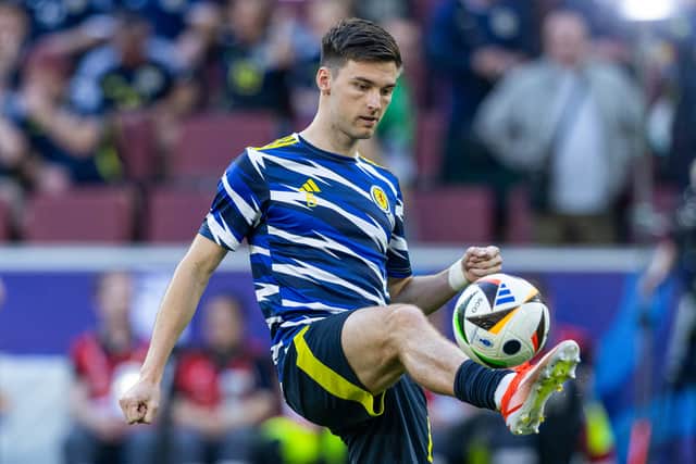 Scotland defender Kieran Tierney has signed a pre-contract with Celtic.
