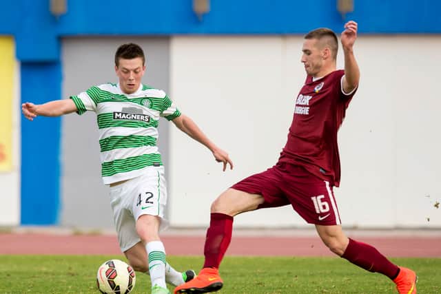 A young Callum McGregor challenges for possession in 2015.