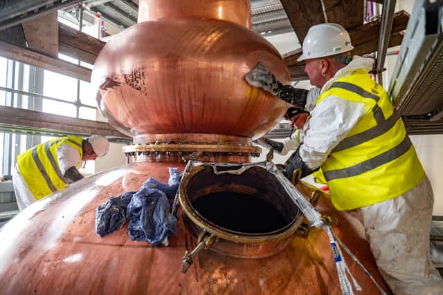 The still being lacquered at Eden Mill distillery