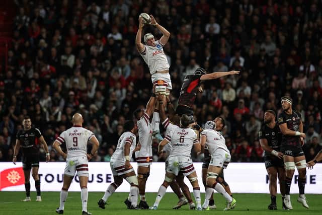 Bordeaux-Begles' Scottish lock Jonny Gray grabs the ball in a line out during the French Top14 match against Toulouse in September. (Photo by VALENTINE CHAPUIS/AFP via Getty Images)
