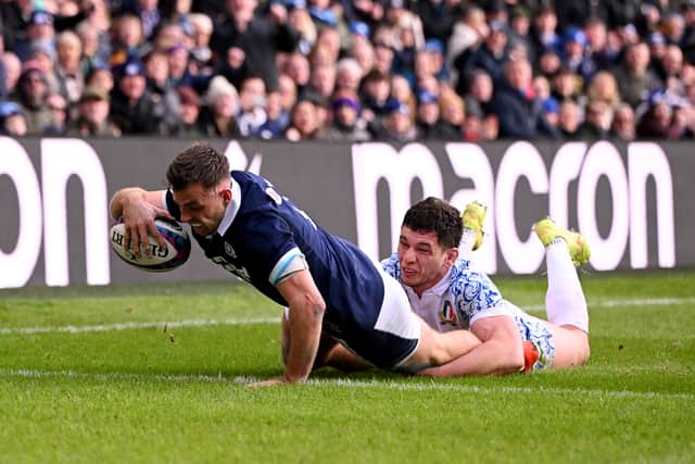 Ben White dives over to score his Scotland's third try in the win over Italy,