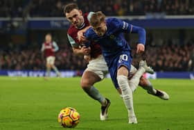 West Ham's Andy Irving challenges Chelsea's Cole Palmer during his first Premier League start. (Photo by ADRIAN DENNIS/AFP via Getty Images)          