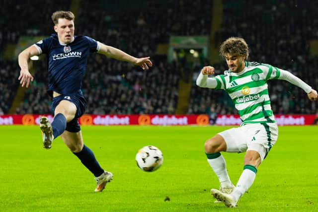 Celtic's Jota and Dundee's Josh Mulligan in action. (Photo by Craig Foy / SNS Group)