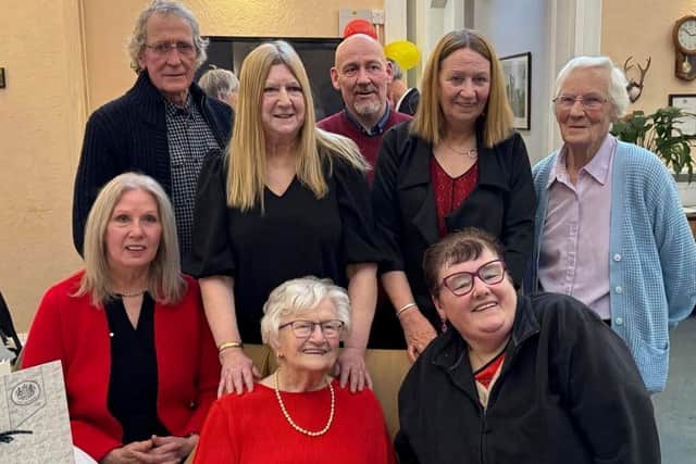 Isa (bottom centre) with family, friends and well-wishers.