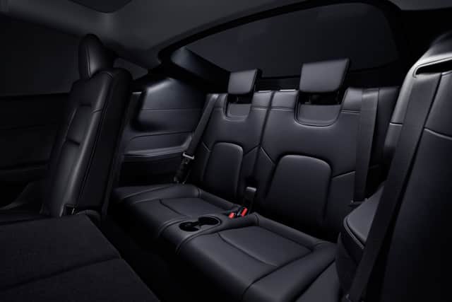 Rear seat space is pretty decent in the Model Y, and there's a superb rear boot