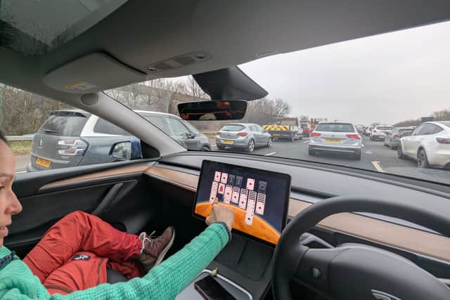 Gareth's wife amuses herself on the gridlocked M6