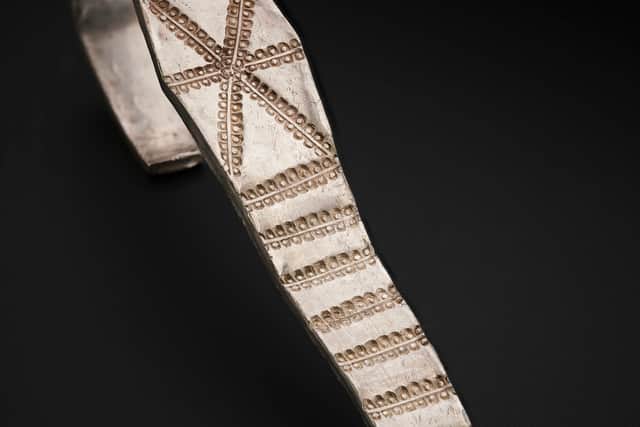 A front view of the Galloway Hoard arm ring with runic inscription. Picture: National Museums Scotland/PA Wire