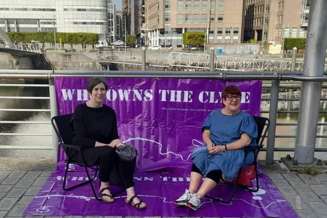 Jude Barber and Professor Louise Welsh (right) on the River Clyde.