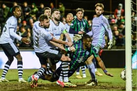 Hibs defender Rocky Bushiri heads home a late winner against Ayr United in the Scottish Cup. (Photo by Rob Casey / SNS Group)