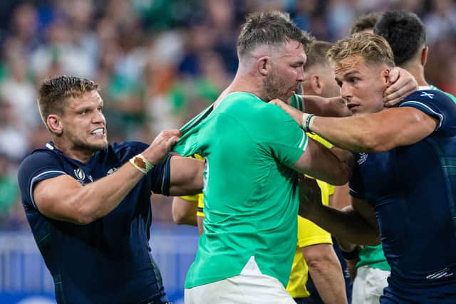 Peter O'Mahony in the thick of it between George Turner and Duhan van der Merwe during Ireland's win over Scotland at the 2023 Rugby World Cup.