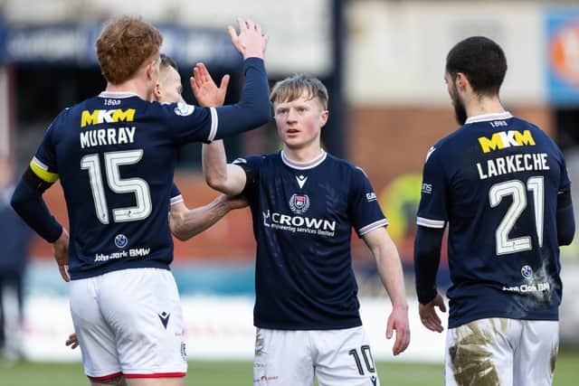 Rangers-bound Lyall Cameron drove Dundee on to a 4-0 win.