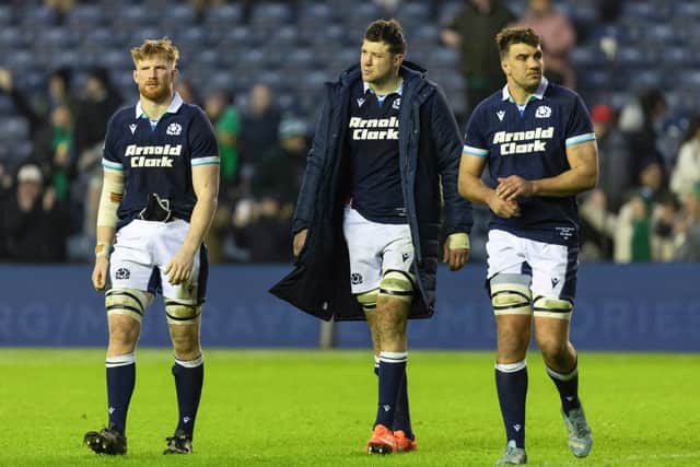 Scotland's Gregor Brown, Grant Gilchrist and Sam Skinner trudge off at full time.