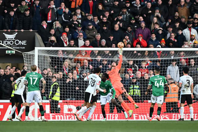 Former Celtic goalkeeper Conor Hazard made some excellent saves as Plymouth held on for victory.