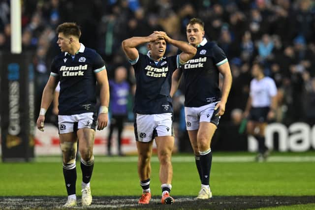 Scotland's Huw Jones, Ben White and Stafford McDowall during the Six Nations match against Ireland at Murrayfield.