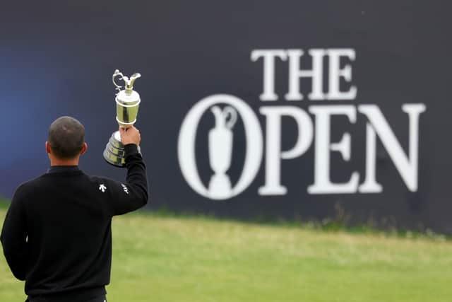 Xander Schauffele poses with the Claret Jug after winning the 152nd Open Championship at Royal Troon last year