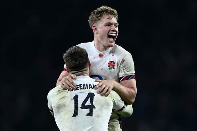 England's Fin Smith and Tommy Freeman celebrate the win over France.