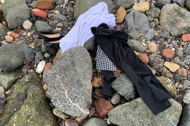The clothes were found near the Boardwalk Beach Cafe.