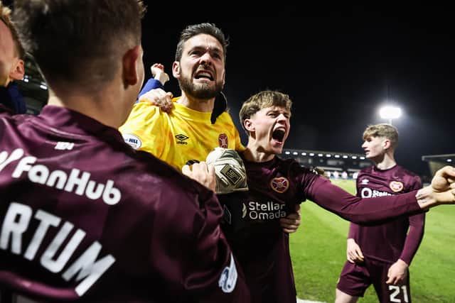Hearts' Craig Gordon and James Penrice celebrate after winning the penalty shootout against St Mirren. (Photo by Ross MacDonald / SNS Group)