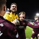 Hearts' Craig Gordon and James Penrice celebrate after winning the penalty shootout against St Mirren. (Photo by Ross MacDonald / SNS Group)