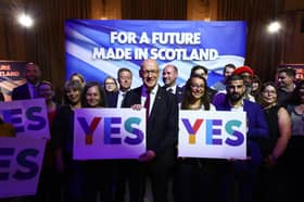 First Minister John Swinney and other SNP supporters backing the Yes campaign.