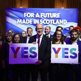 First Minister John Swinney and other SNP supporters backing the Yes campaign.