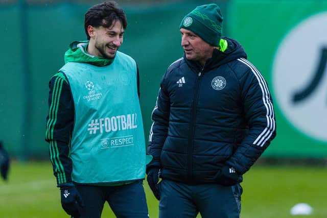 Celtic manager Brendan Rodgers chats with Nicolas Kuhn.
