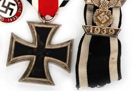 The Nazi medal and Swastika badge sold at auction