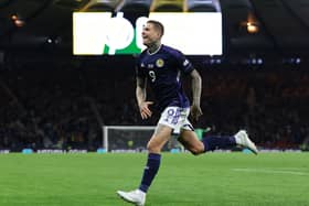 Lyndon Dykes celebrates scoring for Scotland at Hampden Park. Cr: Getty Images.