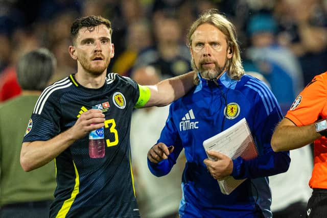 Former Scotland set piece coach Austin MacPhee with captain Andy Robertson during the match against Switzerland at Euro 2024. (Photo by Craig Foy / SNS Group)