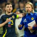Former Scotland set piece coach Austin MacPhee with captain Andy Robertson during the match against Switzerland at Euro 2024. (Photo by Craig Foy / SNS Group)