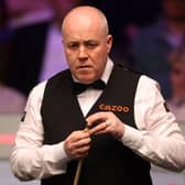 John Higgins has reached the last 32 of the Welsh Open snooker.