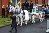 A horse-drawn carriage with the coffin of child murder victim Hope Gordon in Livingston (Picture: Jeff J Mitchell)