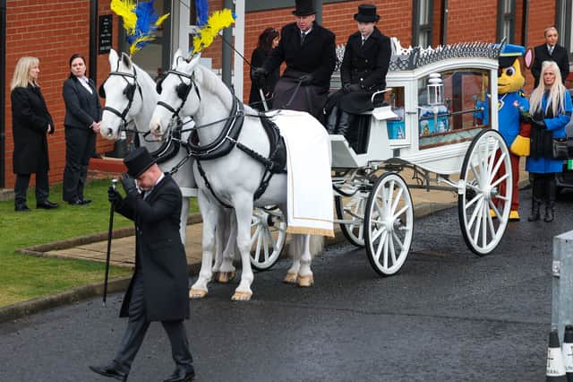 A horse-drawn carriage with the coffin of child murder victim Hope Gordon in Livingston (Picture: Jeff J Mitchell)