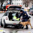 Emergency services attend the scene of an accident after a driver hit a group of people in Munich, Germany
