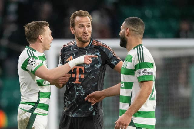 Celtic's Alistair Johnston and Cameron Carter-Vickers share a joke with Bayern Munich striker Harry Kane.