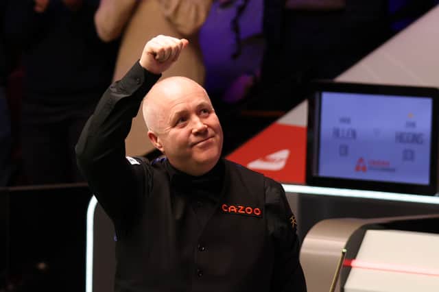 Scotland's John Higgins is through to the last 16 of the Welsh Open snooker.