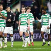 Celtic’s Alistair Johnston salutes the fans at full-time against Bayern Munich.