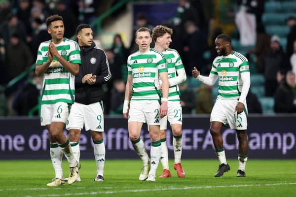 Celtic’s Alistair Johnston salutes the fans at full-time against Bayern Munich.